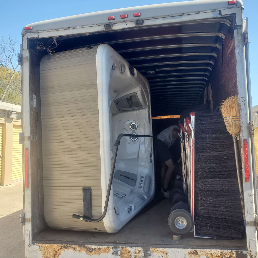 Hot tub movers assessing access path for spa relocation