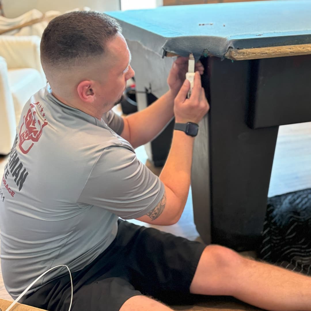 Pool table components organized for reassembly