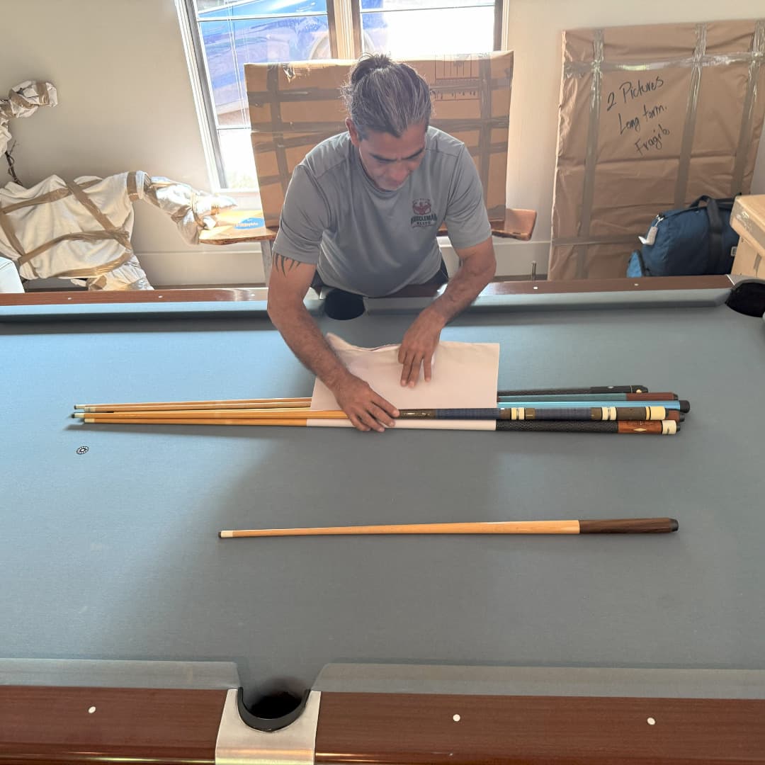 Pool table felt and rails removed for safe transport