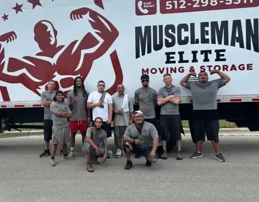 MuscleMan Elite crew in front of a truck