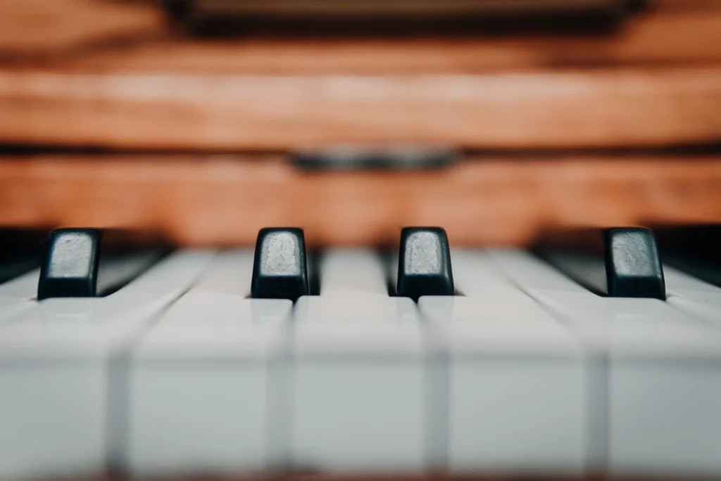 Piano keys with a blurred background.

